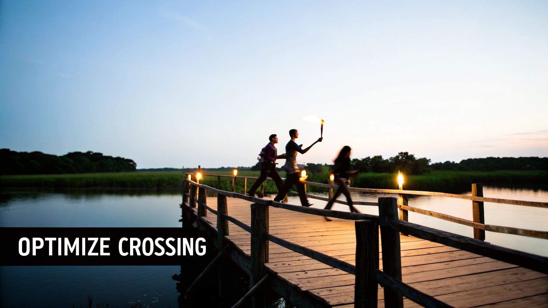 Three people walk across a wooden bridge over water at dusk, one holding a lit torch.